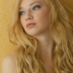 Beautiful womanl with blonde curled hair